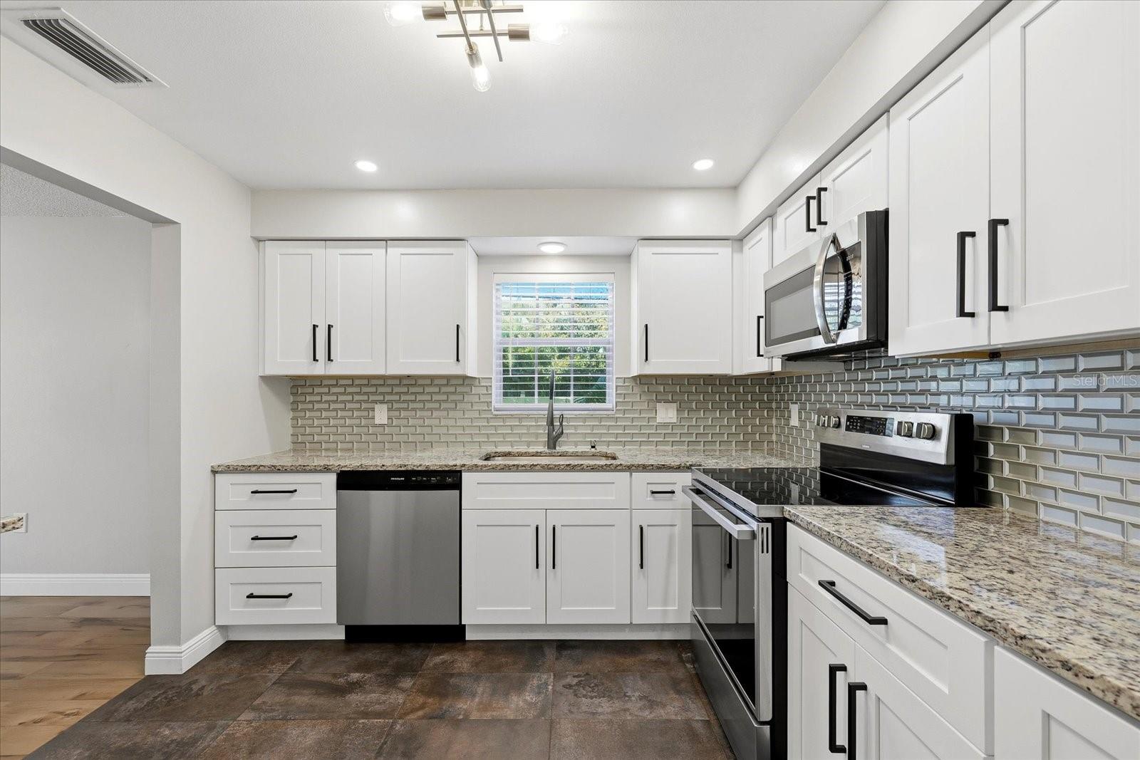 1706 Belleair Forest Unit 128, Belleair, FL 33756