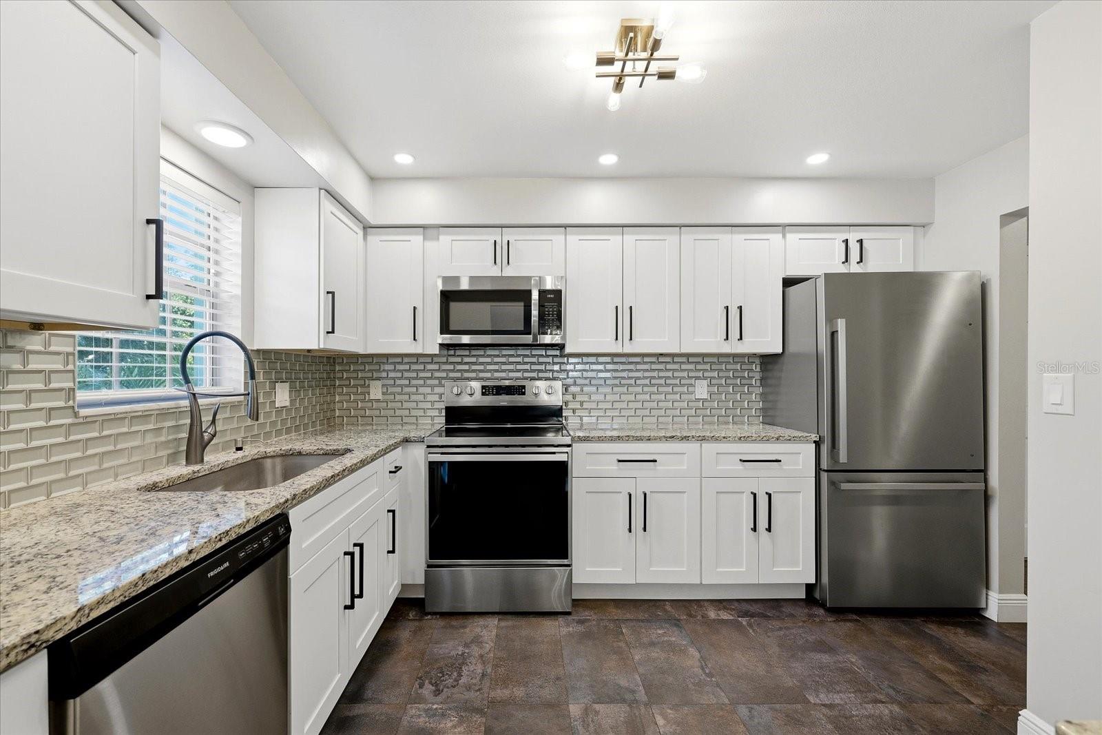 1706 Belleair Forest Unit 128, Belleair, FL 33756